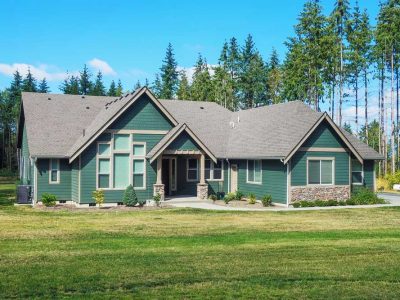 Luxury Single Story Home Exterior Surrounded By Trees